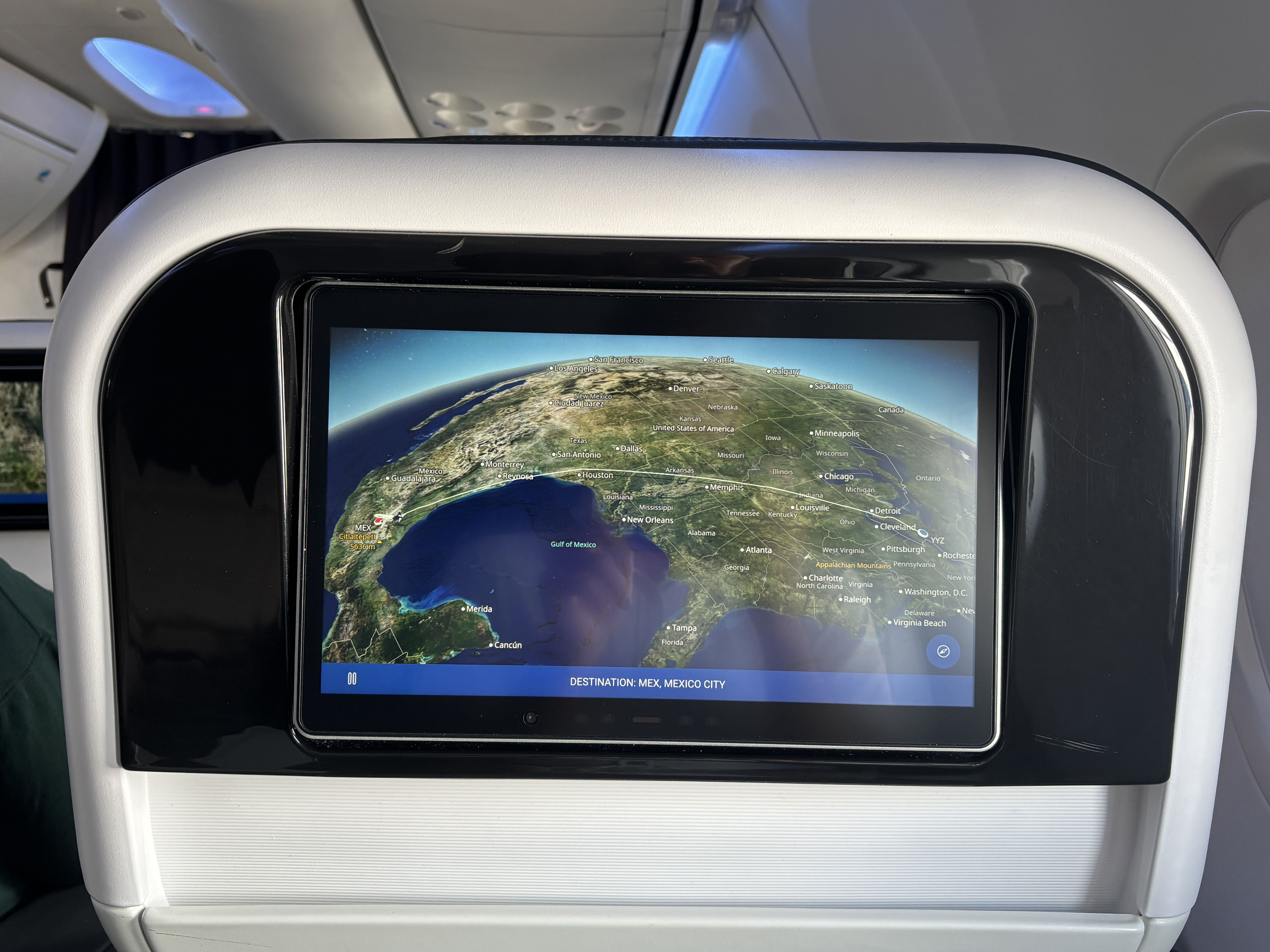 Moving map showing a plane passing over the Gulf of Mexico.