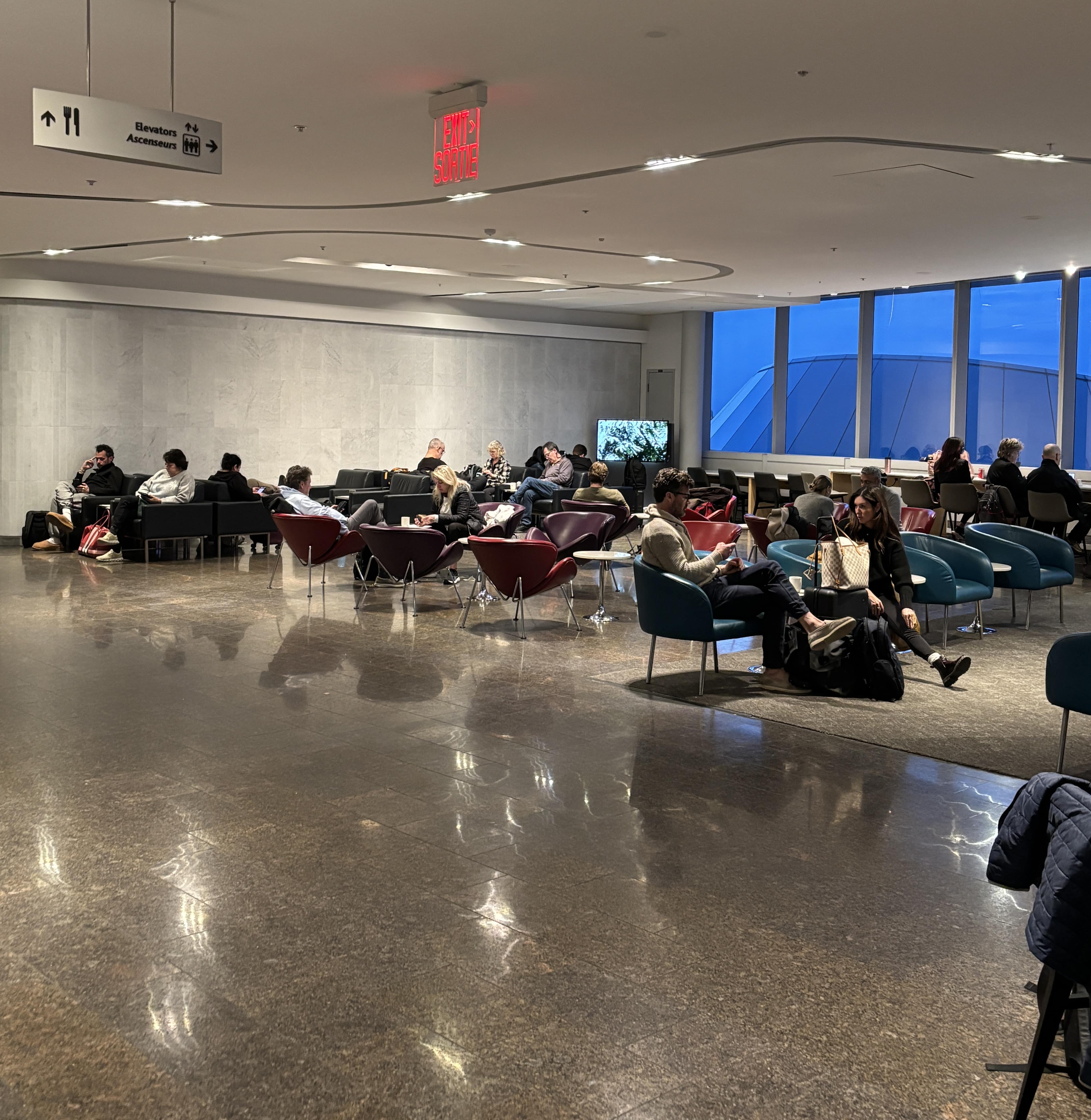 Busy seating area at the transborder Maple Leaf Lounge.