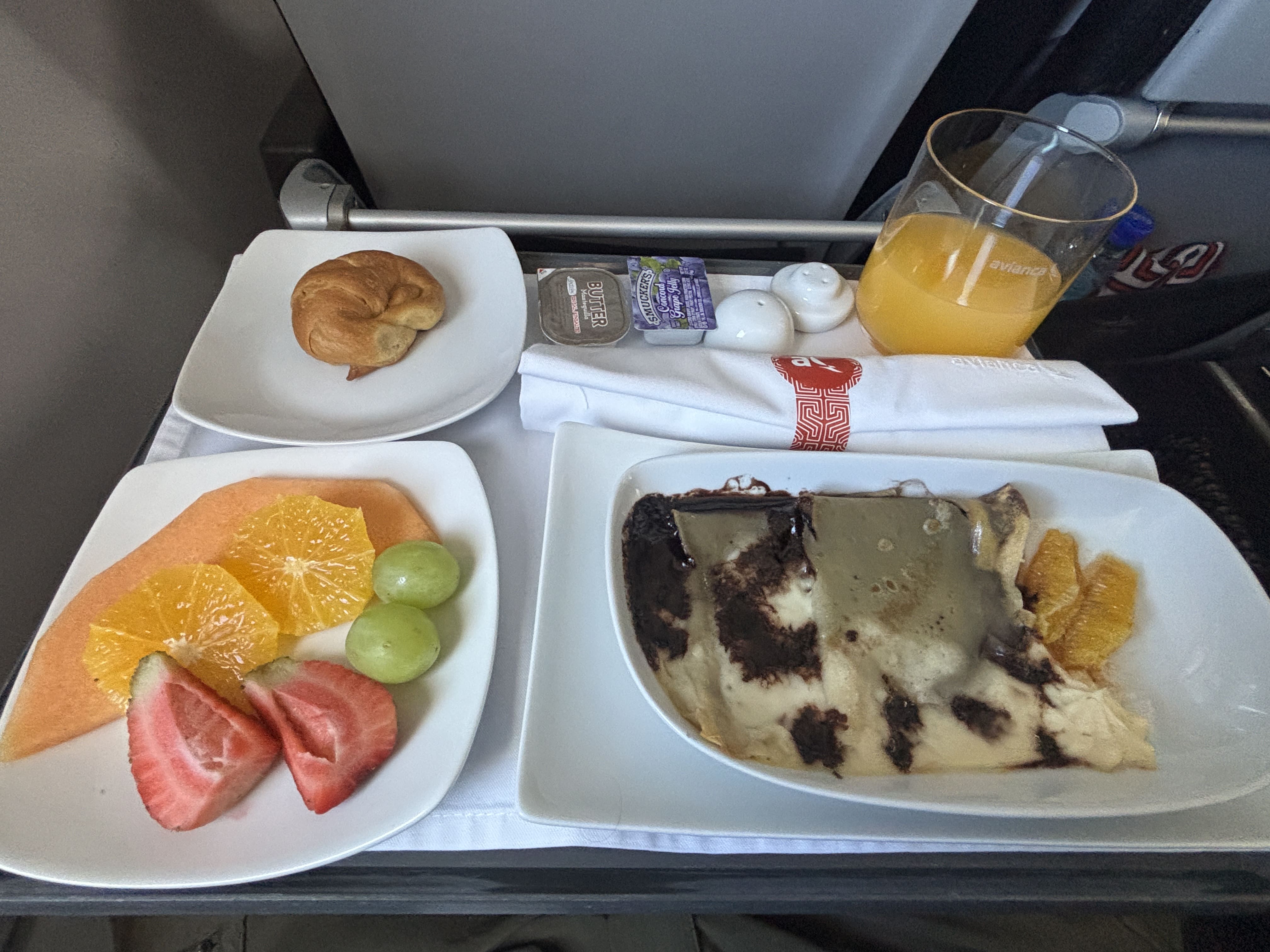 Chocolate crepe breakfast service on Avianca regional business class.