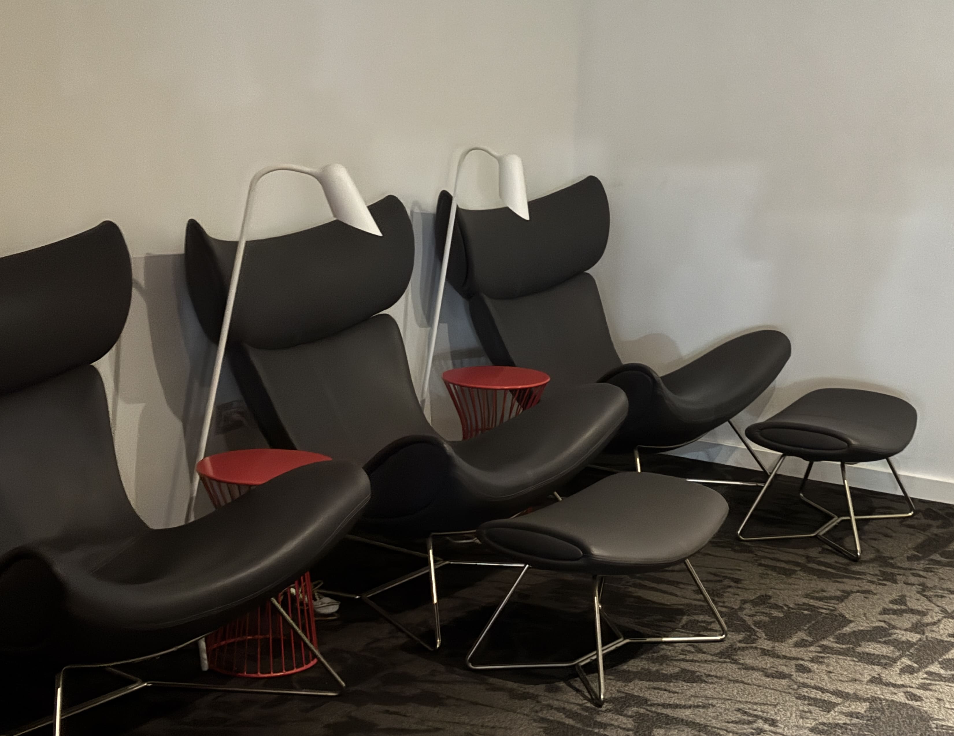 Recliners and ottomans in the Avianca lounge El Salvador.