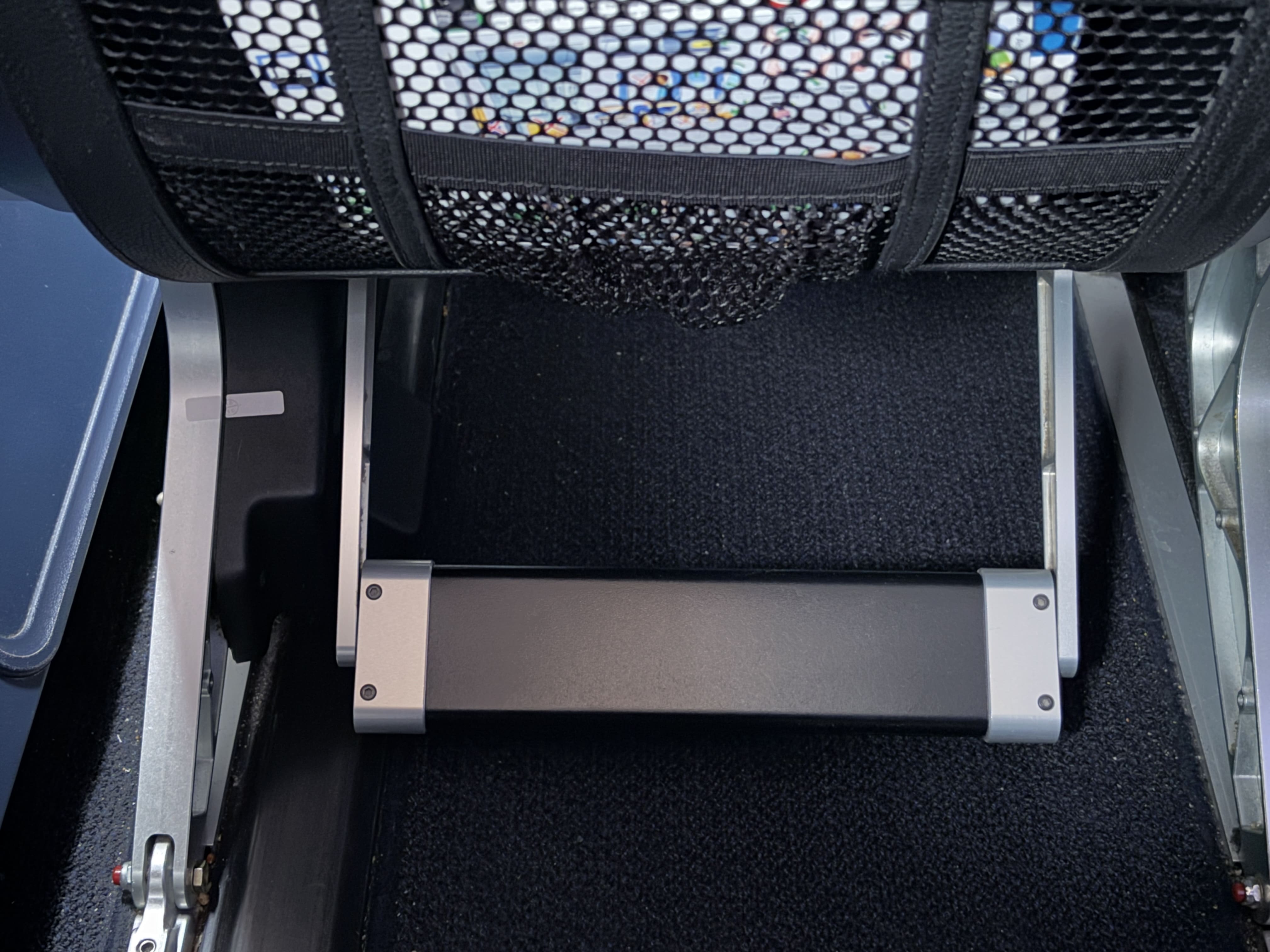 Foot rest extended below a seat.