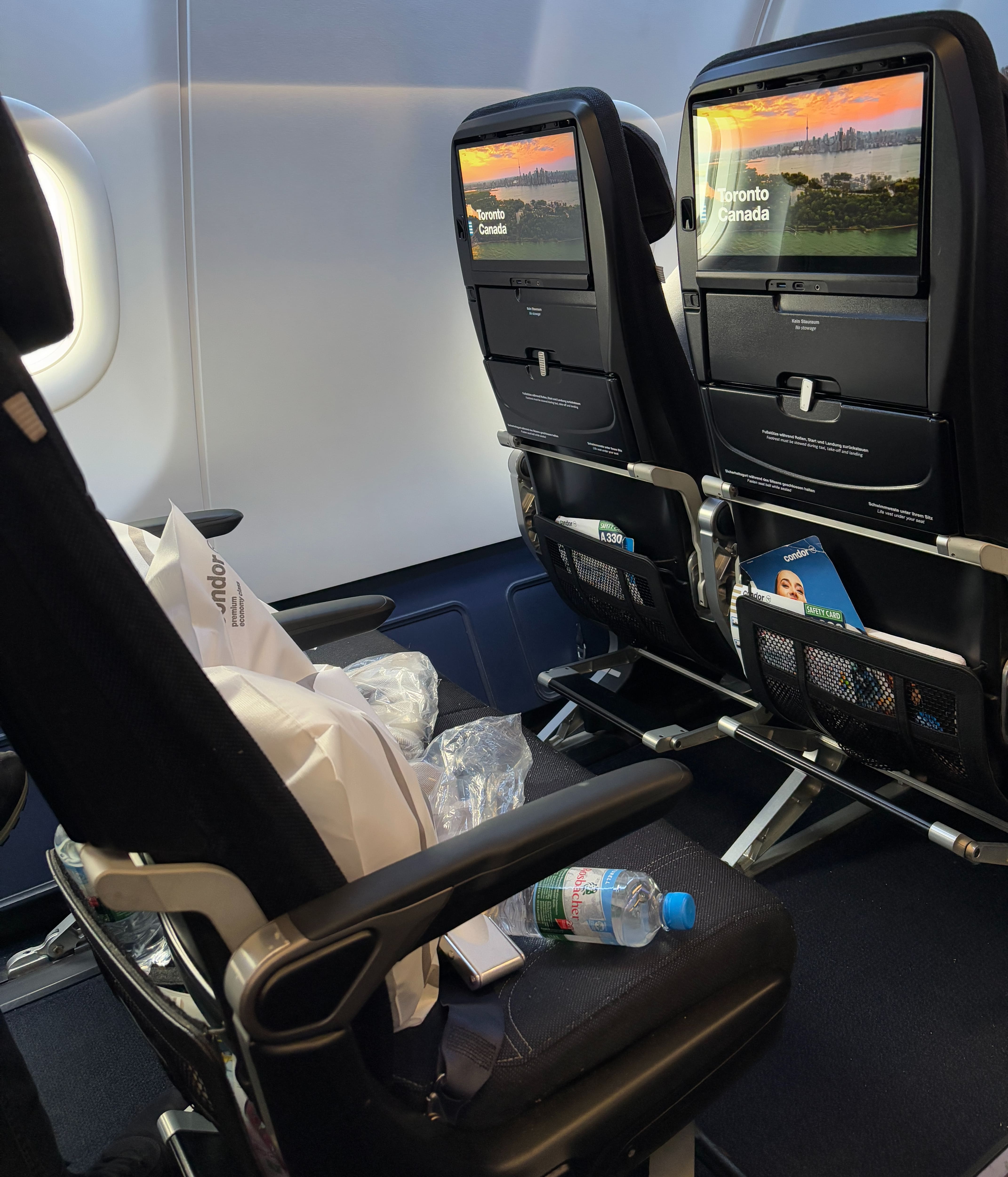 Large seatback entertainment screens shown prior to takeoff.