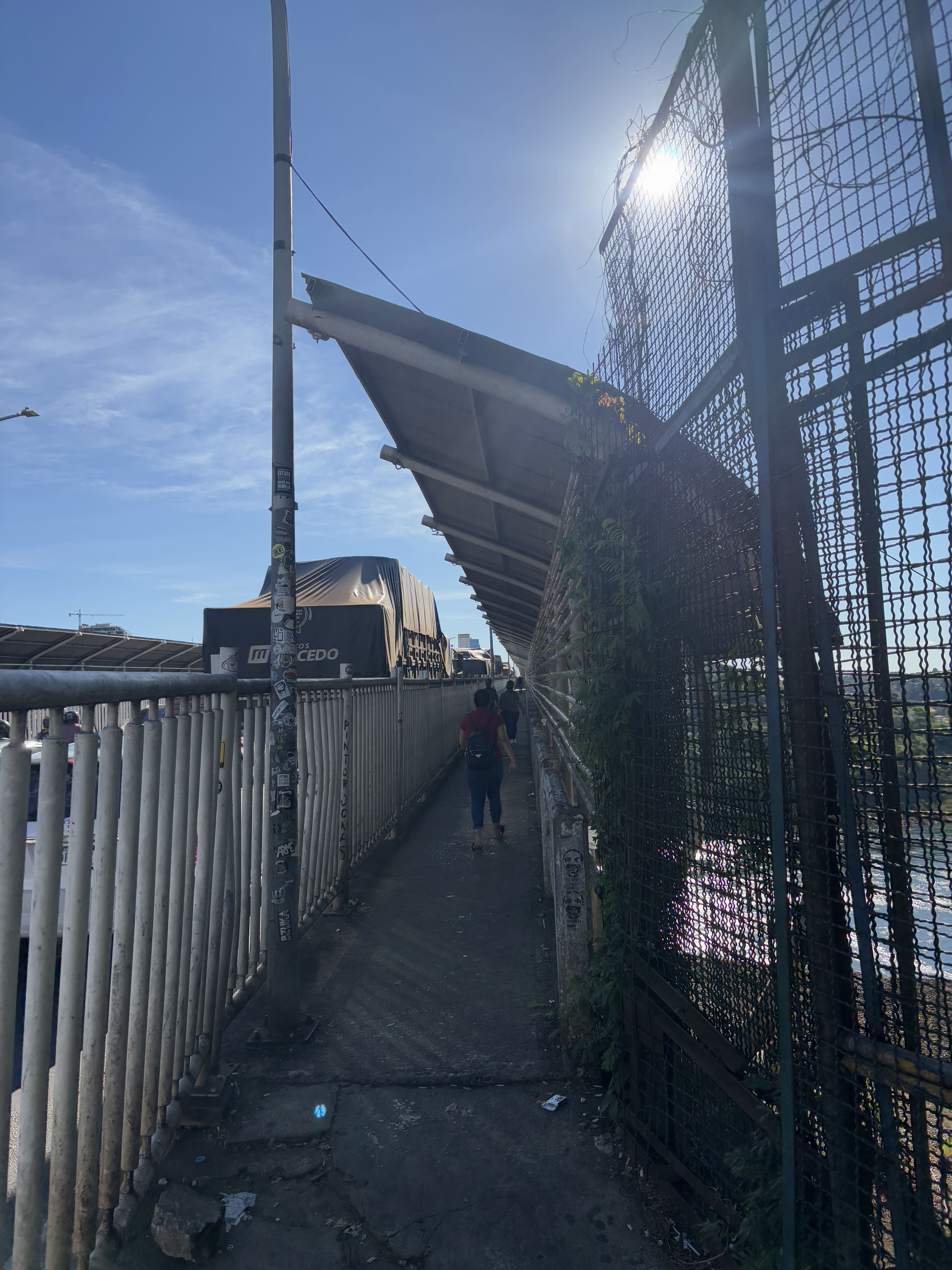 Partially-covered walkway leading from Brazil to Paraguay.