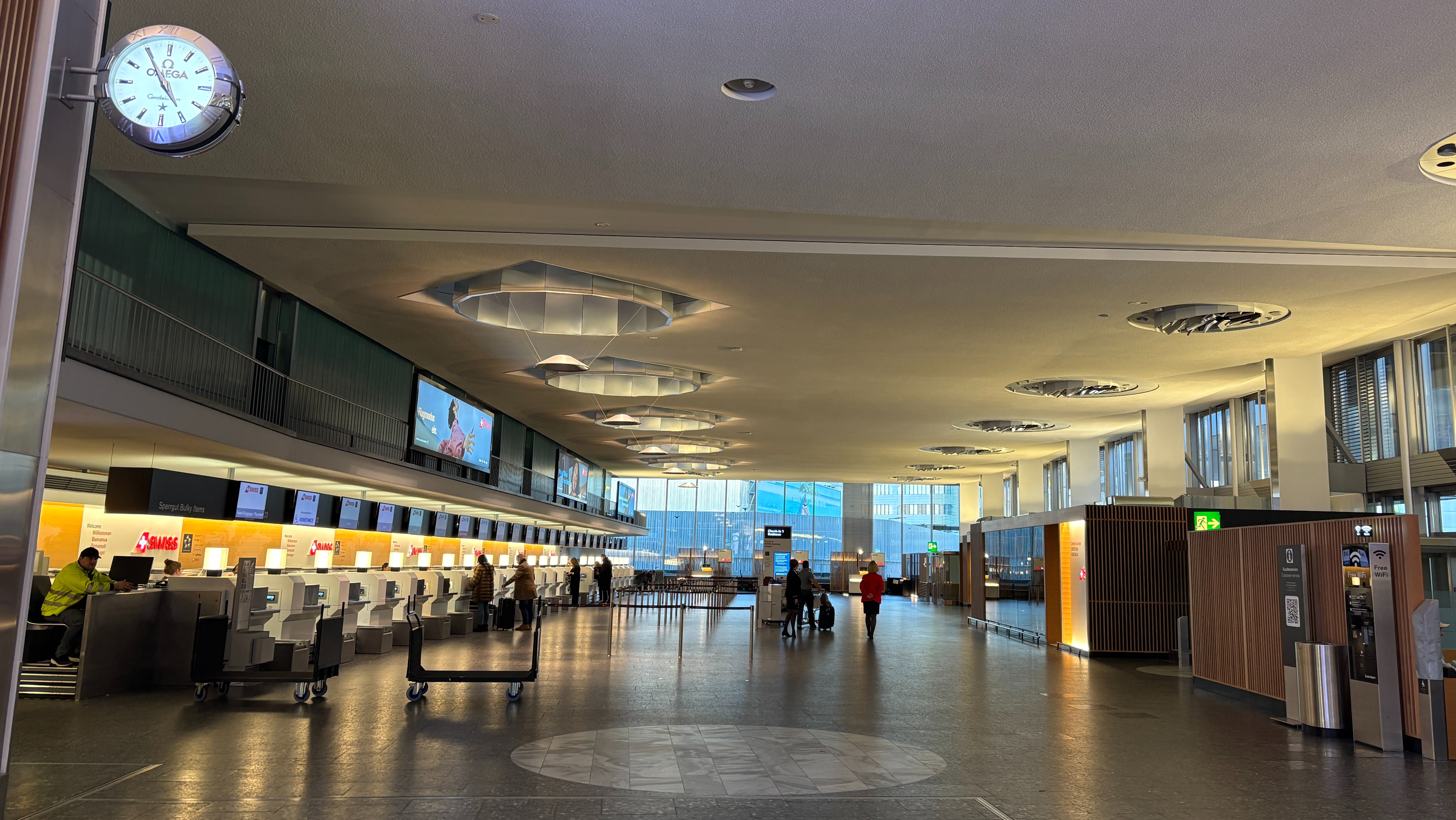 Check-in desks for business and first class passengers at Zurich Airport.