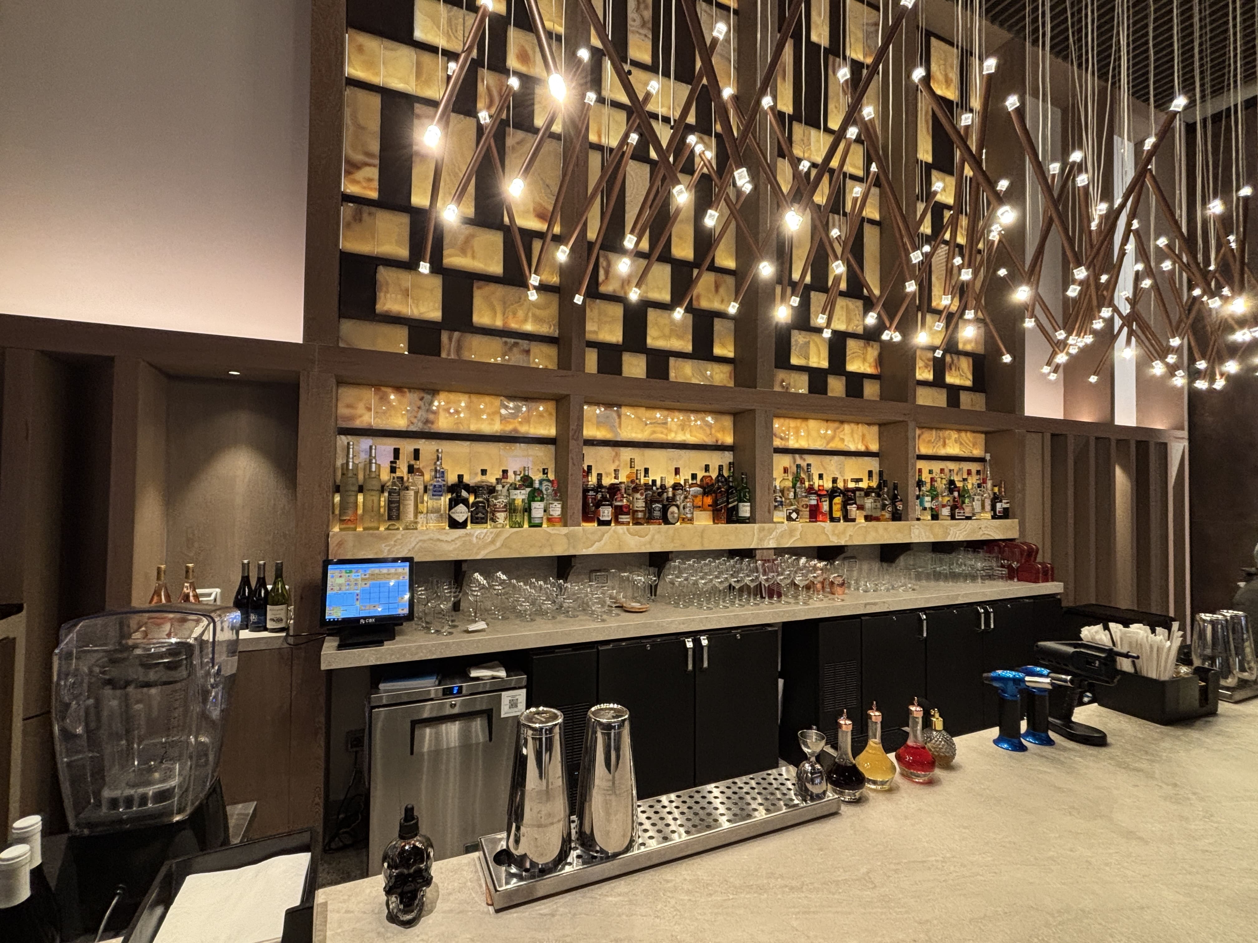 Bar area inside the LATAM Premium Lounge.