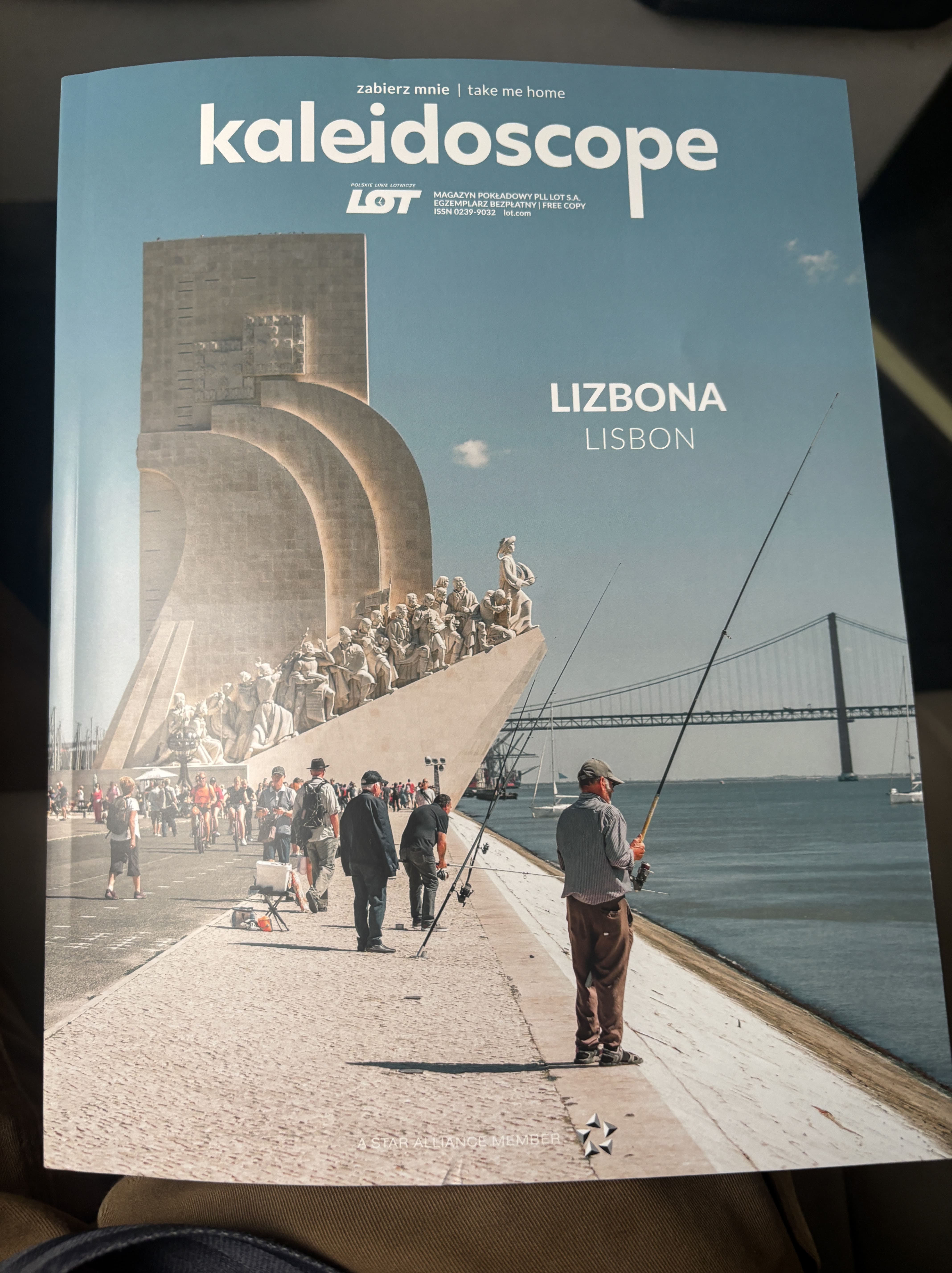 In-flight magazine of LOT, Kaleidoscope, with light-blue front cover advertising its Lisbon services.