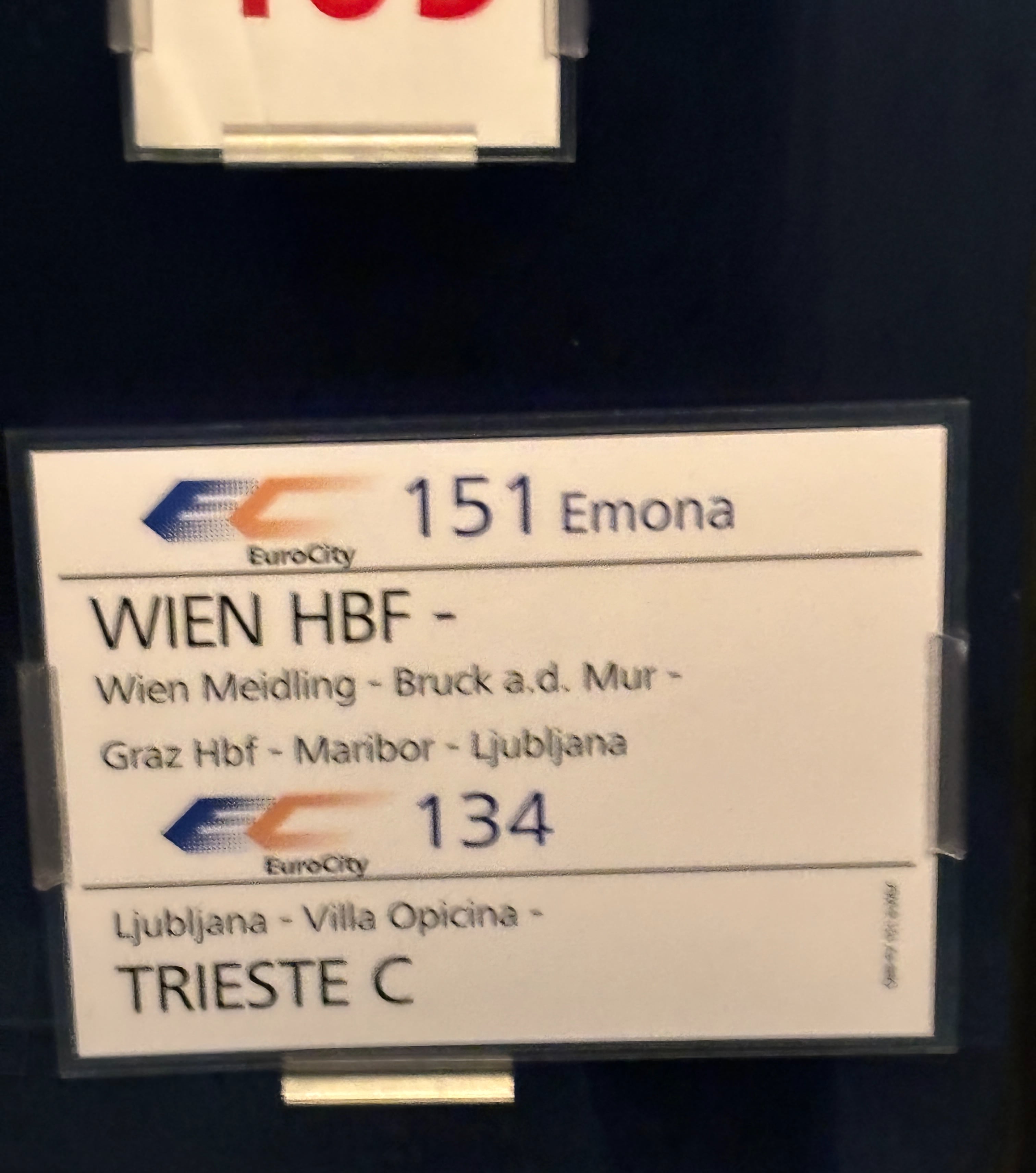 Sign on coach door.