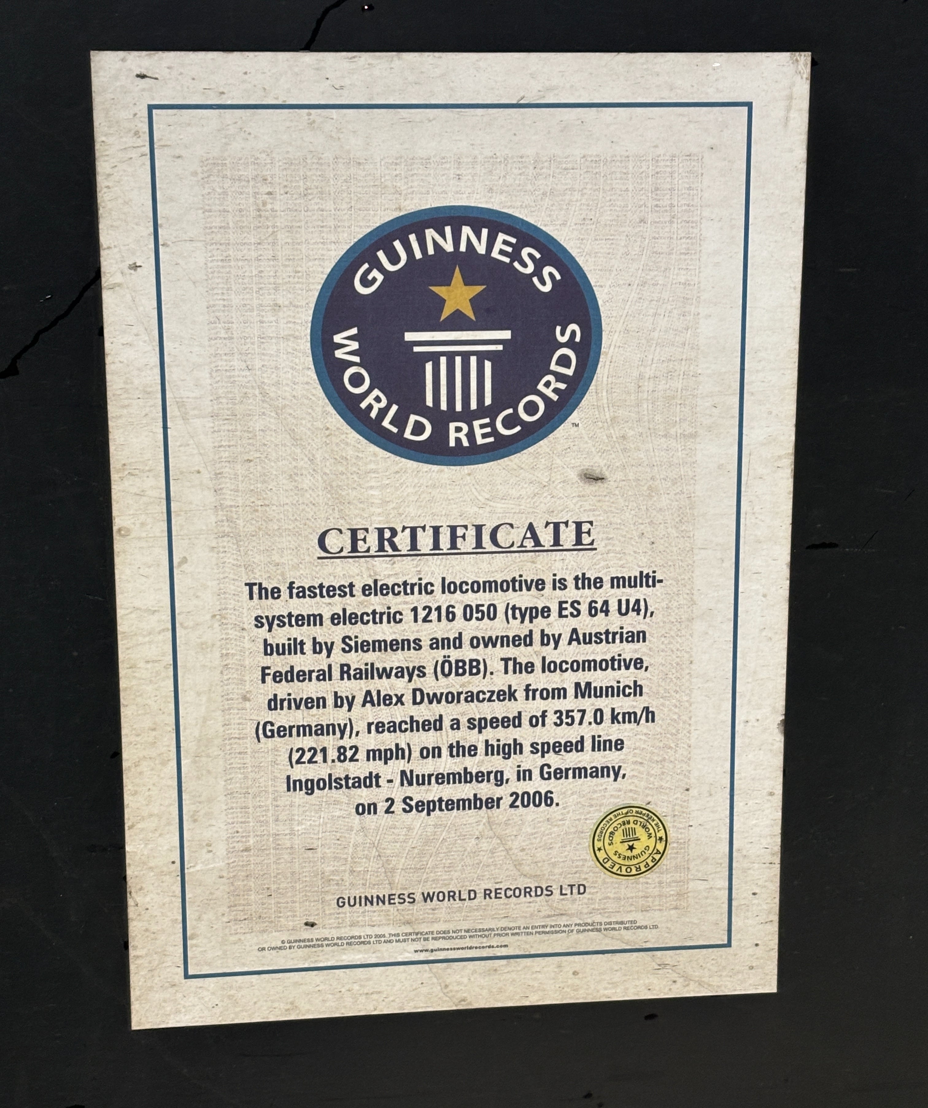 Plaque commermorating the world record speed run displayed on our locomotive.
